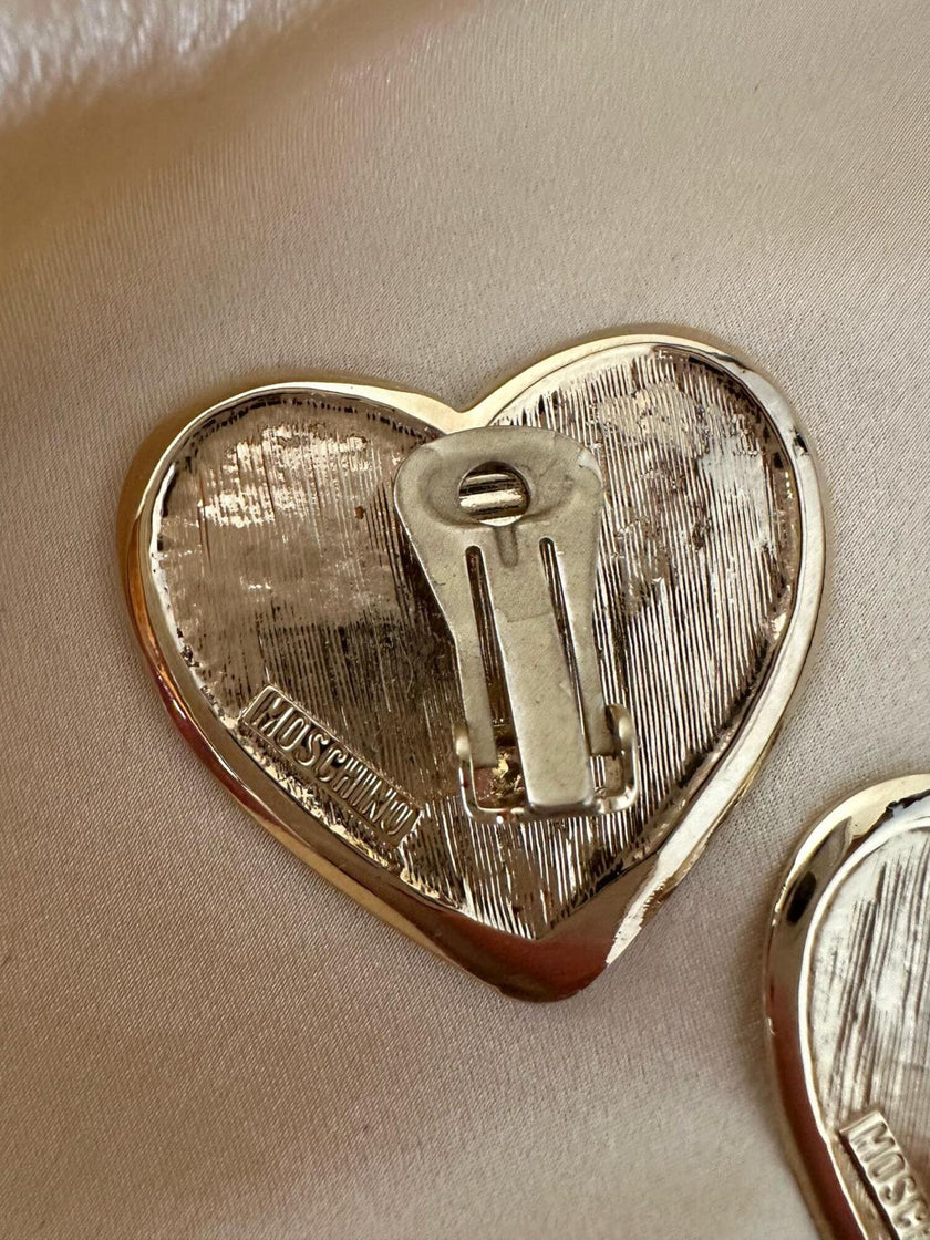 Maxi clip dorate a forma di cuore “Moschino”