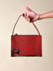 Borsa Laura Biagiotti in pelle stampa lizard color cognac con iniziali BL
