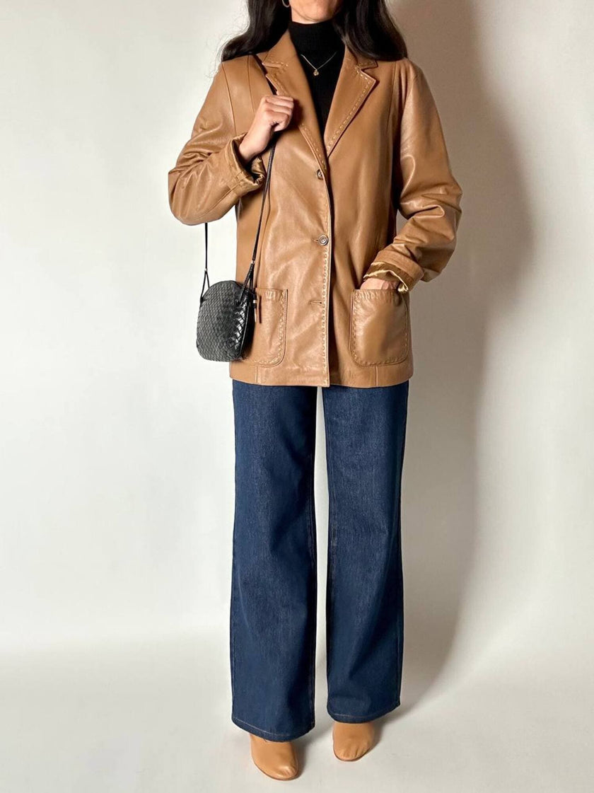 Vintage tan leather jacket with hand-stitched detailing by Claude Collections