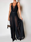 Costume intero nero con inserti in tulle e lavorazione a rilievo