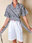 Moschino blue and white striped wrap blouse with embroidered peace symbol