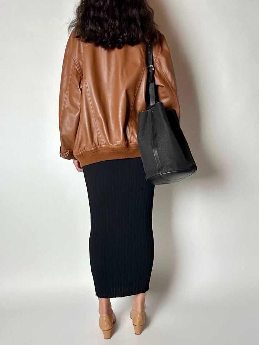 Secchiello vintage Yves Saint Laurent in tessuto nero millerighe con riporti in pelle