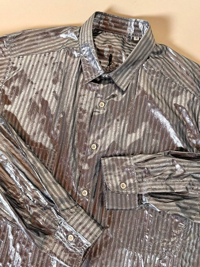 Camicia oversize in lamé argento lavorata a righe