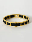 Bracciale vintage Fendi in metallo dorato con inserti in pelle nera intrecciata