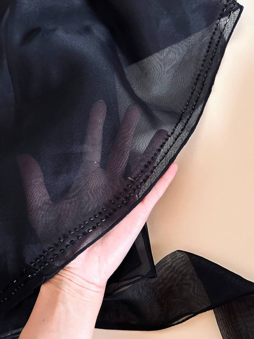 Top incrociato in organza nera con ricamo in perline “Per Te By Krizia”