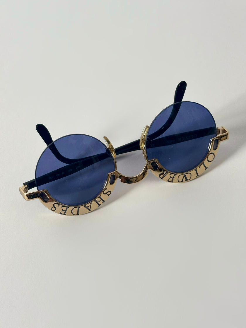 Occhiali da sole vintage Oliver Valentino con montatura gioiello dorata e lenti blu