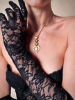 Collana dorata con ciondolo pendente a cuoricini “Yves Saint Laurent”