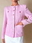 Blazer in lana bouclé rosa con bottoni gioiello logati in madreperla “Yves Saint Laurent”