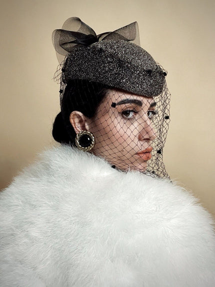 Cappellino con veletta in lurex oro e tulle nero Marzi Firenze