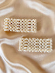 Polsiere elasticizzate di perle sintetiche bianche