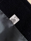 Cappotto doppiopetto oversize in lana nera