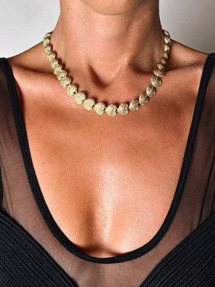 Collier vintage Degerny con cuori dorati lavorati