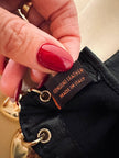 Guanti in pelle nera con charm dorati a forma di cuore “Sermoneta”