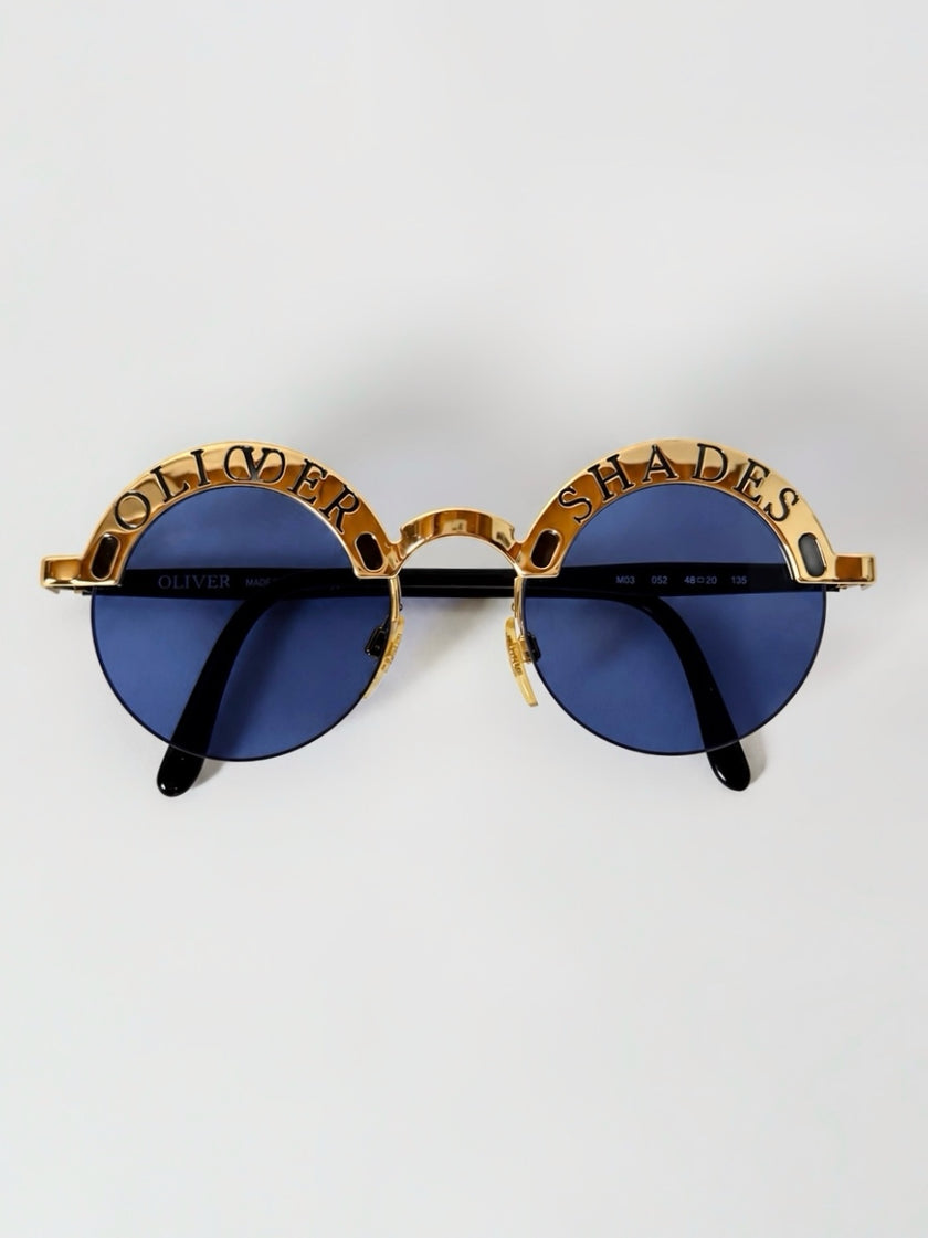 Occhiali da sole vintage Oliver Valentino con montatura gioiello dorata e lenti blu