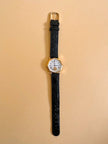 Orologio con quadrante esagonale e cinturino in coccodrillo nero 