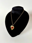 Collier vintage Yves Saint Laurent con ciondolo a forma di cuore firmato e cabochon rosso