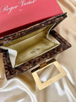 Vintage Roger Vivier leopard-print python clutch with a distinctive rectangular gold-tone metal clasp