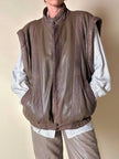 Bomber con maniche rimovibili in pelle color fango “Arpell”