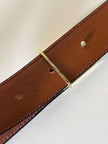Vintage Yves Saint Laurent tan leather belt with an octagonal enamel buckle and YSL logo