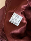 Pantalone in pelle mattone rosato a vita alta con pince e cintura in coordinato La Matta