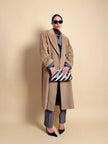 Cappotto doppiopetto in drap di lana cammello 