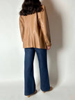 Vintage tan leather jacket with hand-stitched detailing by Claude Collections