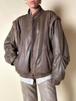 Bomber con maniche rimovibili in pelle color fango “Arpell”
