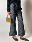 Pantalone a trombetta Merchant Archive in jacquard lamé bluette nero e oro