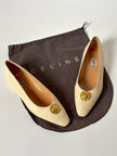 Ballerine vintage Celine Paris in pelle avorio con medaglioni dorati logati