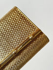 Clutch-Minaudière vintage in metallo oro satinato con dettaglio bambù