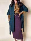 Cardigan Carven in lana verde con manica a tre quarti e cintura in vita