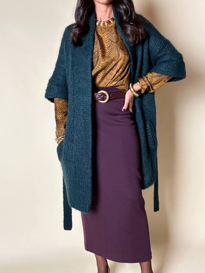 Cardigan Carven in lana verde con manica a tre quarti e cintura in vita