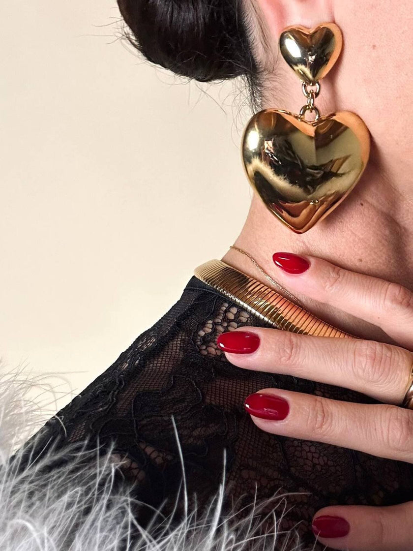 Maxi clip oro con cuori pendenti “Moschino”