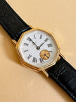 Orologio con quadrante esagonale e cinturino in coccodrillo nero 