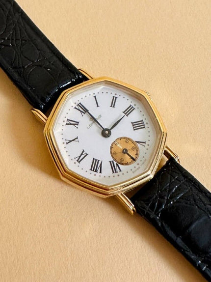 Orologio con quadrante esagonale e cinturino in coccodrillo nero 