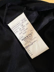 Abito/gonna in crepe di seta nero con frange a balze
