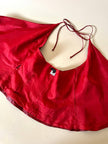 Wrap top in pelle rossa “Marina Babini”