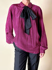 Camicia in seta a quadretti fucsia e neri con con fiocco al collo “Valentino”