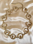 Cintura dorata a catena con charm a forma di B “Blumarine”