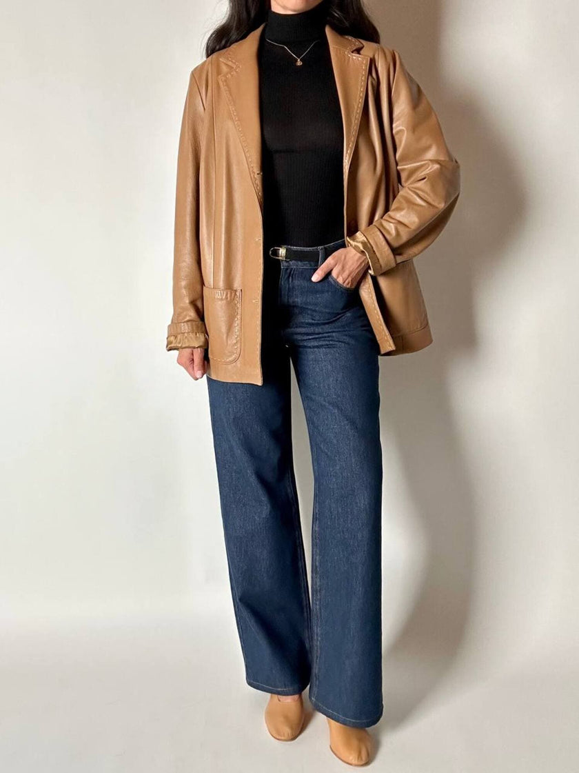 Vintage tan leather jacket with hand-stitched detailing by Claude Collections