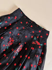 Gonna a ruota in organza jacquard nera a pois rossi con rose rosse dipinte