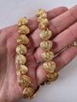 Vintage Degerny necklace with ornate gold hearts