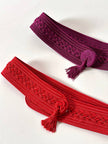 Cintura vintage rossa realizzata con intreccio di passamanerie e nappa couture