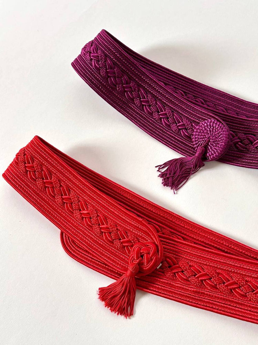 Cintura vintage rossa realizzata con intreccio di passamanerie e nappa couture