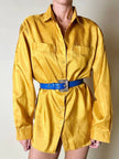 Cintura vintage Yves Saint Laurent in pelle bluette con fibbia gioiello dorata