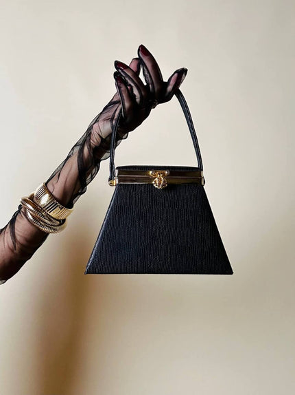 Mini bag a trapezio in ecopelle nera stampa lizard