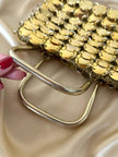 Mini bag gioiello a medaglie dorate