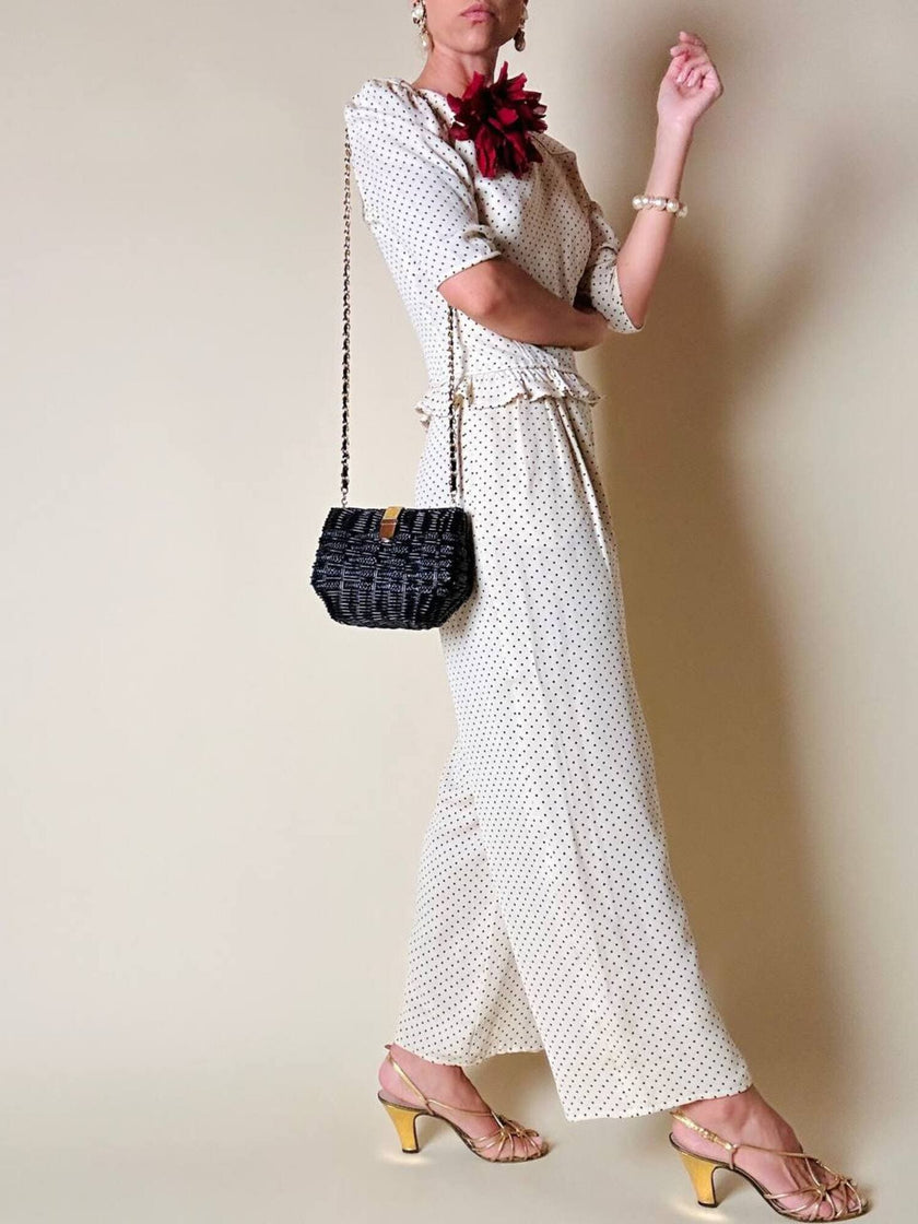 Sac bandoulière en osier et raphia noir avec bandoulière chaîne dorée
