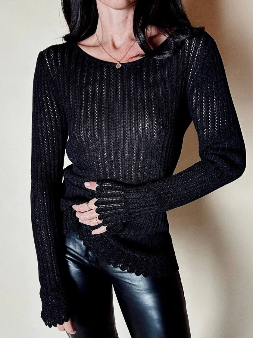 Maglia vintage Yves Saint Laurent nera traforata con profili smerlati