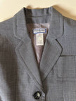 Giacca grigia con martingala “Yves Saint Laurent”